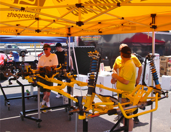 MM products displayed in the shade, with MM Techs and Engineers available to answer questions.

